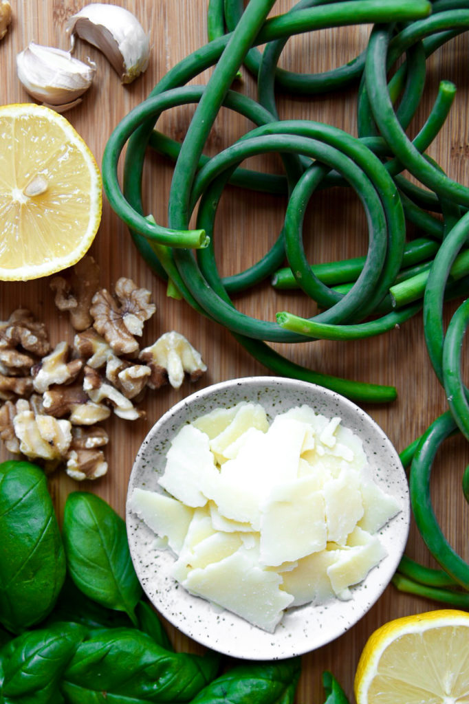 pesto ingredients on a wooden cutting board