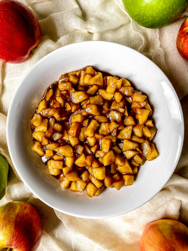 apple cinnamon turnover filling in a white bowl