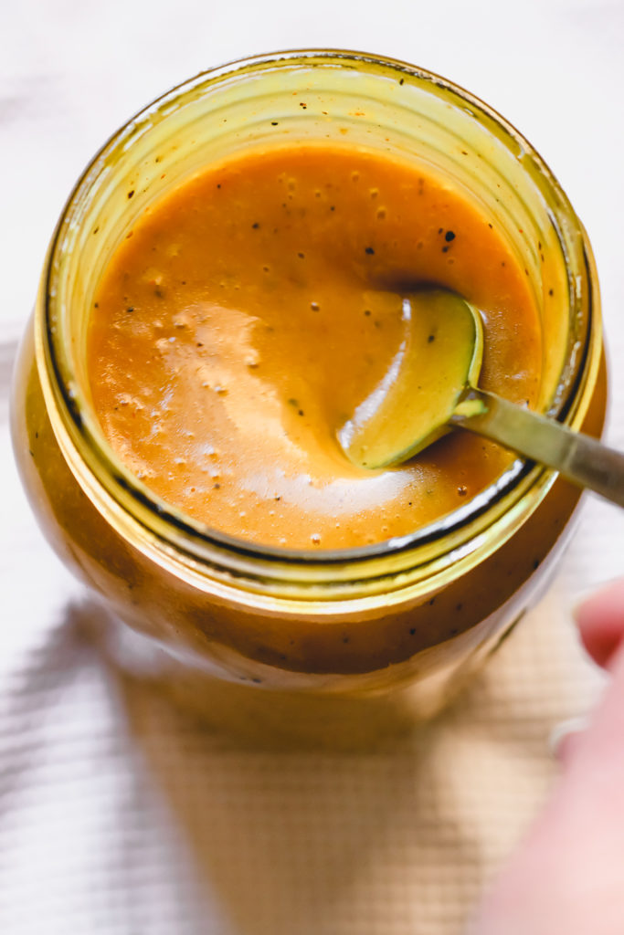 mango chutney vinaigrette in a jar