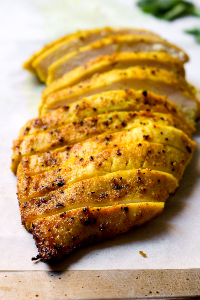 close up of a sliced grilled chicken breast